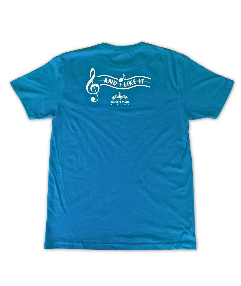 Rear image of a blue t-shirt, featuring the stylized wavy text reading "And I like it" next to a large treble clef on the left.